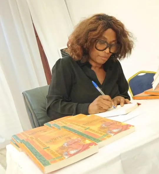 The writer Awondo Calixte signs her book titled  " My passion, my Country " published by Ifrikya editions